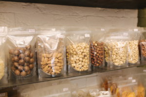 various-nuts-packaged-package-sale-market-closeup-healthy-vegan-foods_152637-1906